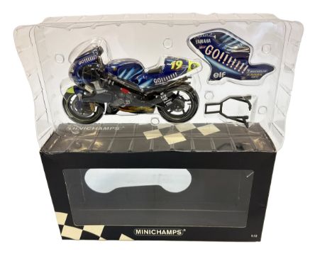 A Minichamps 1:12 scale model of the Yamaha YZR 500 as ridden by Olivier Jacque for the Gauloises Tech3 Yamaha team during th
