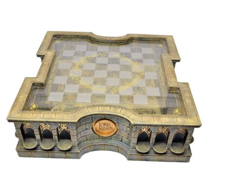 Lord of the Rings collector’s edition chessboard by The Noble Collection. This intricately designed board features Elvish scr