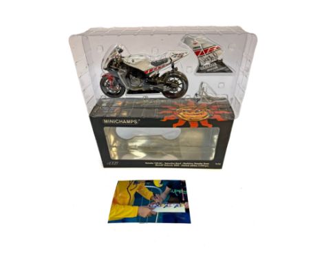A Minichamps 1:12 scale die-cast model of the Yamaha YZR-M1 as raced by Valentino Rossi for the Gauloises Yamaha Team at Moto
