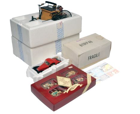 A group of three boxed model sets, including a highly detailed 1:8 scale 1886 Benz Patent-Motorwagen from Franklin Mint in or