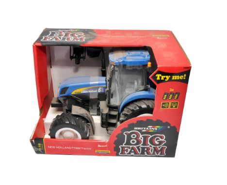 Britains Big Farm 1/16 New Holland T7060 Tractor. Dusty but secure in box.