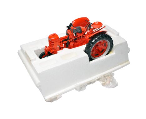 A Franklin Mint 1/12 scale detailed die-cast model of a vintage Case farm tractor, presented in its original polystyrene pack