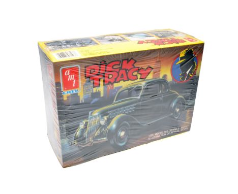 A sealed AMT/ERTL 1/25 scale plastic model kit of the classic Dick Tracy car. Presented in original shrink-wrapped packaging 