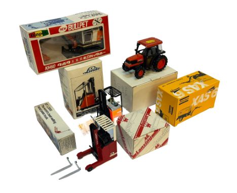 An assortment of diecast construction issues comprising lift trucks, portable compressor, mini-excavator and compact tractor.