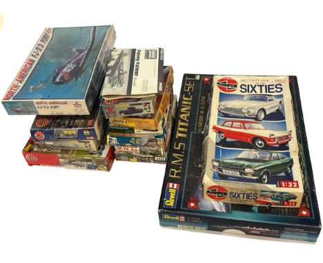 A group of vintage model kits including examples by Airfix, Revell, Matchbox, Italeri, and Frog. The lot features a variety o