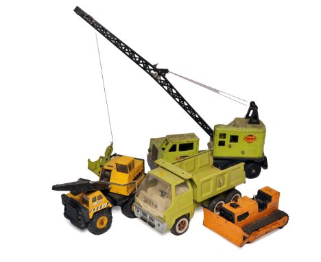 A group of vintage pressed steel construction vehicles including models by Tonka and Structo, comprising a crane truck, dump 