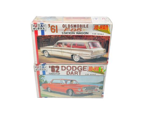 A duo of Jo-Han USA Oldies 1/25 scale plastic car kits, comprising the 1961 Oldsmobile F-85 Station Wagon and the 1962 Dodge 