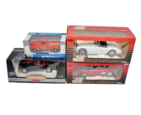 A group of boxed die-cast model cars from various manufacturers, including Maisto, Ertl American Muscle, and Tonka Real Racer