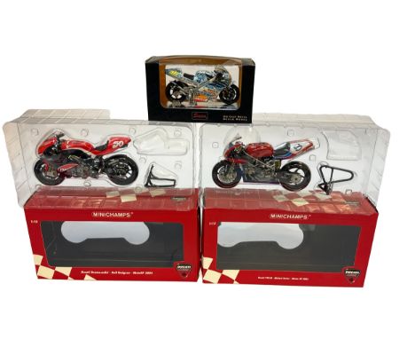 A group of three boxed motorcycle models including two Minichamps 1:12 scale Ducati models – the Ducati Desmosedici MotoGP 20