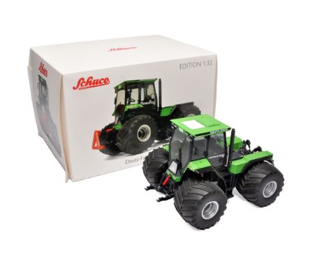 Schuco 1/32 farm model issue comprising Deutz-Fahr Intrac 6.60 Tractor on flotation tyres. Displayed but no obvious sign of f