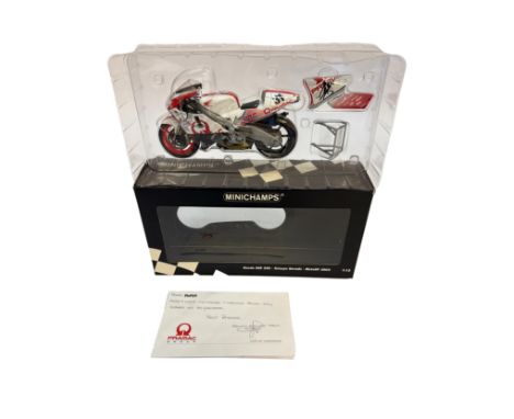 A Minichamps 1:12 scale model of the Honda NSR 500 as raced by Tetsuya Harada for the Pramac team during the 2002 MotoGP seas