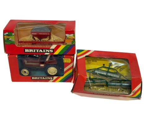 A trio of older issue Britains 1/32 farm models comprising Fiat Tractor, plus two implements, as shown. Generally excellent i