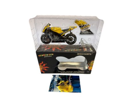 A Minichamps 1:12 scale die-cast model of the Yamaha YZR-M1 as raced by Valentino Rossi for the Gauloises Yamaha Team at Moto
