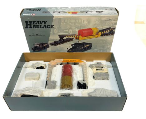 A Corgi Heavy Haulage die-cast truck set in 1:50 scale, featuring the Wynns liveried tractor unit with multi-axle trailer and