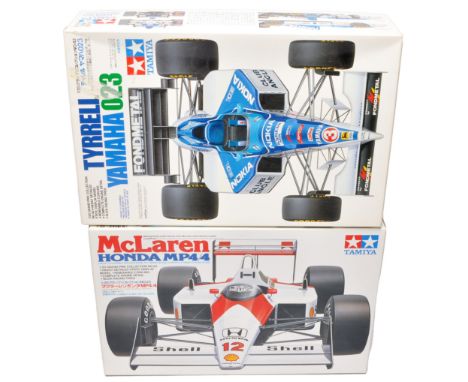 A duo of Tamiya 1:20 scale Formula 1 model kits, including the Tyrrell Yamaha 023 and McLaren Honda MP4/4. As New.