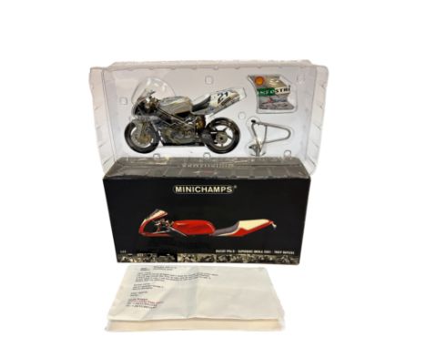 A Minichamps 1:12 scale die-cast model of the Ducati 996 R Superbike as raced by Troy Bayliss at Imola in 2001. Includes a pr