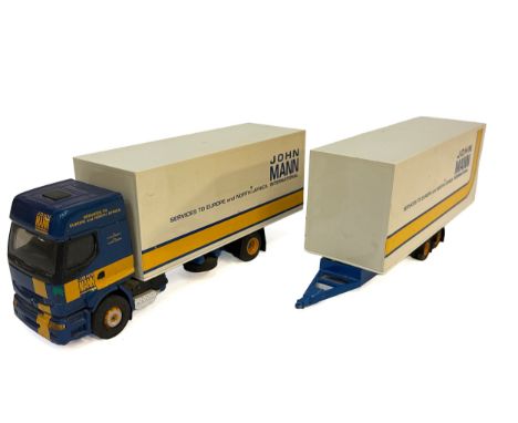 An Eligor or similar Model Truck issue in John Mann livery, featuring a Mercedes-Benz articulated box truck and a matching dr