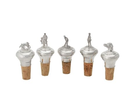 Five silver mounted bottle stoppers by A. J. Poole, Birmingham 2002 (1), 2007 (2) and 2009 (1), topped with sporting figures,