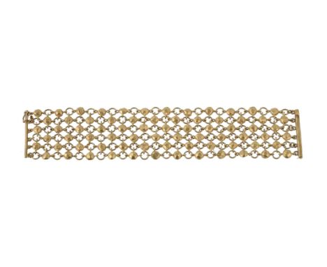 A gold coloured mesh link bracelet by Talisman, the hooped links with facetted circular panel links between, to a slide bar c