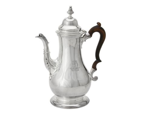 An early George III silver baluster coffee pot by Thomas Whipham & Charles Wright, London 1760, with a lobed bell shaped fini