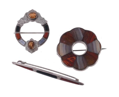 A Scottish hardstone brooch, circa 1880, the hooped brooch with polished red jasper, bloodstone and banded agate accents, to 