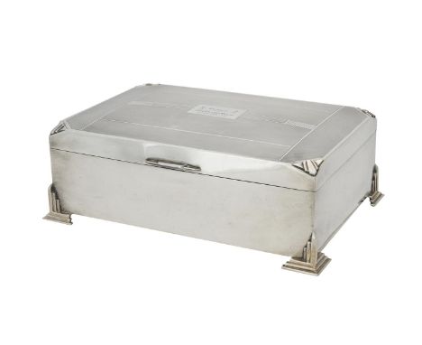 A large silver mounted cigar box by Charles S. Green & Co. Ltd., Birmingham 1947, with canted corners and engine turned decor