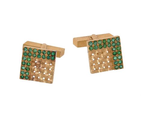 A pair of emerald cufflinks, the square panels with woven detail and circular cut emerald accents, 1.6cm wide, with swivel te