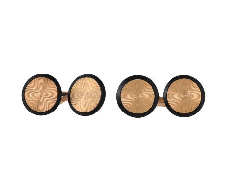 A pair of 1930s French onyx cufflinks, the circular engine turned panels within a polished onyx border, 1.3cm diameter, with 
