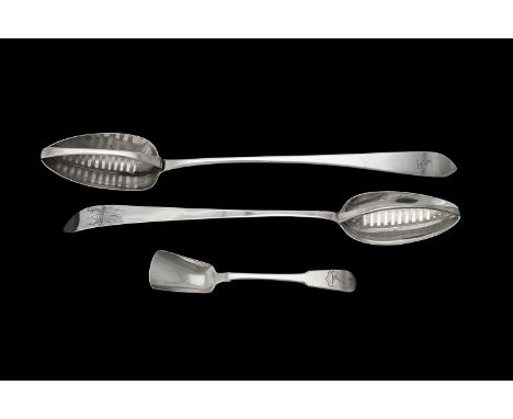 A George III Irish silver pointed Old English pattern serving spoon by John Dalrymple, Dublin 1788, engraved with a crest abo