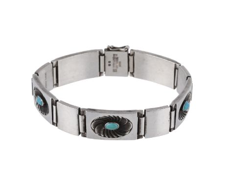 A silver and turquoise bracelet by Henry Pilstrup for Georg Jensen, circa 1940, design number 56, with polished squared panel