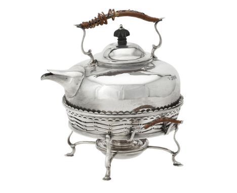 A late Victorian silver circular kettle on stand by George Nathan & Ridley Hayes, Chester 1897, with a wicker wrapped loop ha