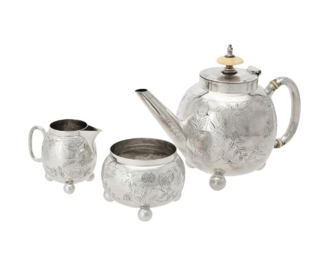 Y A Victorian silver globular three piece tea set by Charles Boyton (II), London 1882, the tea pot with an ivory domed finial