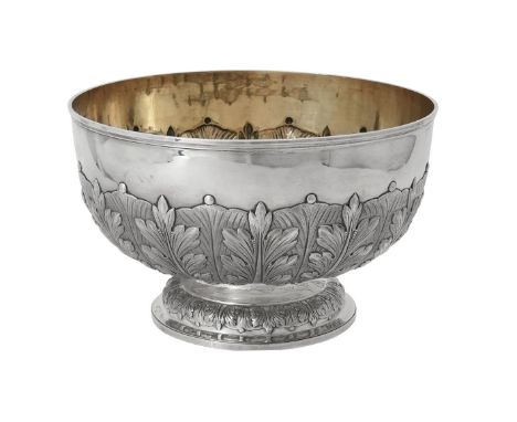 A Victorian silver circular pedestal punch bowl by Charles Stuart Harris, London 1892, the half foliate chased body on a circ