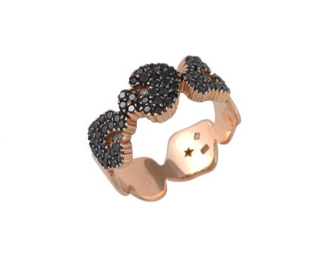 A black diamond and diamond Ancient America ring by H. Stern, the black diamond and diamond wild cat print ring, stamped 750 