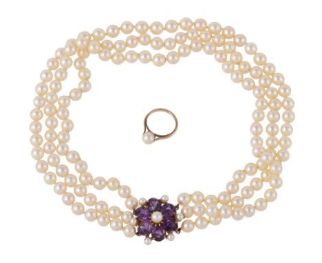 A three row cultured pearl necklace, the three graduated rows of uniform cultured pearls to a amethyst and cultured pearl flo
