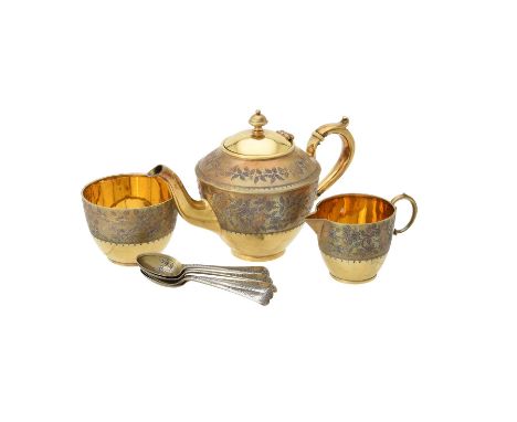 Y A cased Victorian silver gilt three piece tea set by Elkington & Co. Ltd., Birmingham 1892 (1) and 1893 (2), the tea pot wi