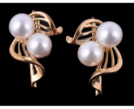A pair of 1960s cultured pearl earrings by Mikimoto, the earrings with pierced scrolled detail and set with a pair of culture