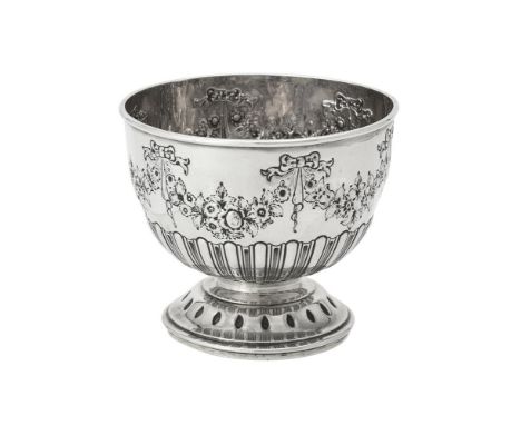 A late Victorian silver pedestal bowl by James Deakin & Sons, Sheffield 1893, the half fluted and lobed body chased with ribb