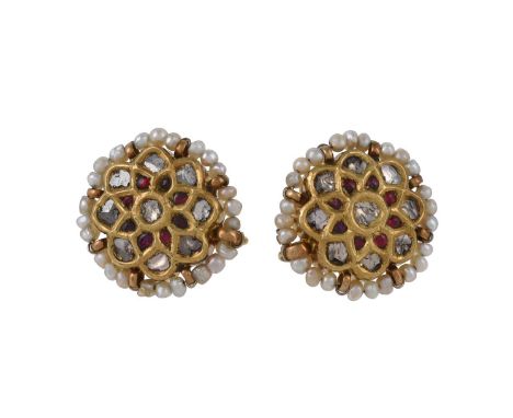 A pair of Indian diamond and seed pearl flower head earrings, the flower head panels set with polki diamonds with red enamel 