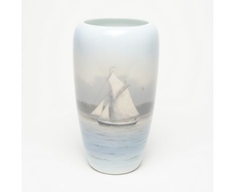A ROYAL COPENHAGEN PORCELAIN VASE20th century The slender ovoid body depicting a sailing vessel, green printed and blue paint