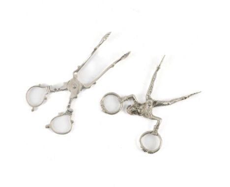 TWO PAIRS OF SUGAR NIPS (2)The first Sheffield 1904, weight 38 grams, the second European, designed as a harlequin holding lo