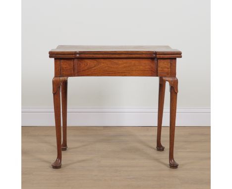 A MID 18TH CENTURY PADAUK RECTANGULAR BREAKFRONT CARD TABLEwith dished gaming wells on pad feet, 79cm wide; 38cm deep; 79cm h
