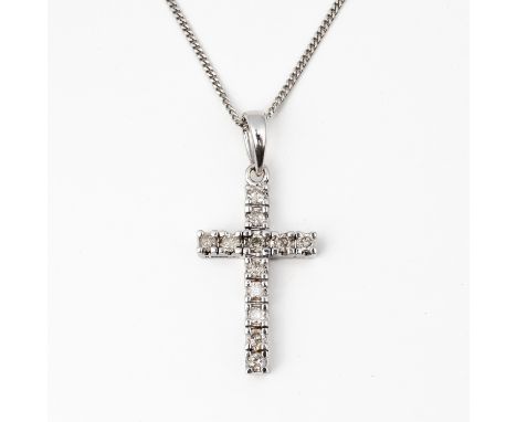 A WHITE GOLD AND DIAMOND PENDANT CROSS (2)The pendant cross mounted with round brilliant cut diamonds, detailed 375, with a w