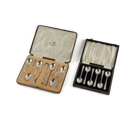 A SET OF SIX SILVER TEASPOONS WITH PAIR OF SUGAR TONGS, CASED AND A SET OF SIX SILVER COFFEE SPOONS, CASEDThe first set with 