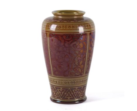 A PILKINGTON'S LANCASTRIAN VASE DESIGNED BY WILLIAM S. MYCOCKCirca 1906-13 Slender ovoid form painted in ruby lustre and gold