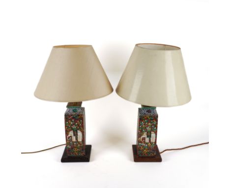 A PAIR OF SOUTH EAST ASIAN CERAMIC POLYCHROME TABLE LAMPS (2)Late 20th Century 
Of square section with waisted neck decorated