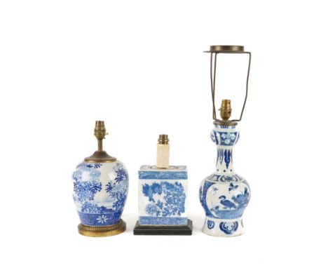 A GROUP OF THREE BLUE AND WHITE CERAMIC TABLE LAMPS (3)Comprising: a Delft earthenware glazed baluster example, 18th Century,