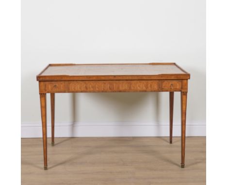 A LATE 18TH CENTURY CONTINENTAL MARQUETRY INLAID WALNUT AND KINGWOOD GAMES TABLEThe lift off top with reversible baize under 