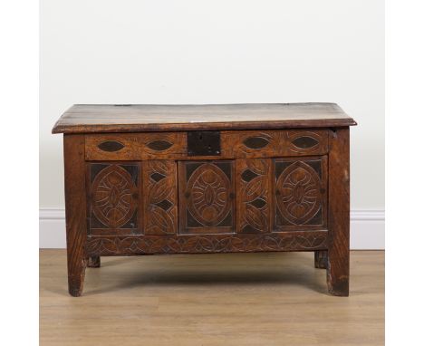 A MID 17TH CENTURY OAK COFFERWith carved panel front, 93cm wide; 46cm deep; 56cm high