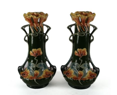 A PAIR OF MODERN CONTINENTAL ART NOUVEAU STYLE CERAMIC VASESWith green ground decorated with flowers, 60cm high